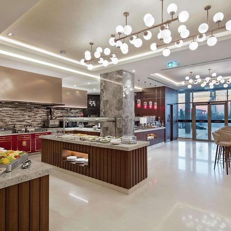 Hotel Doubletree By Hilton Skopje Exteriér fotografie The Kitchen Table